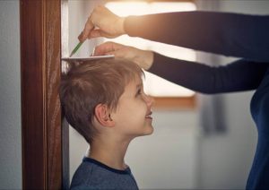 Estatura de un niño americano